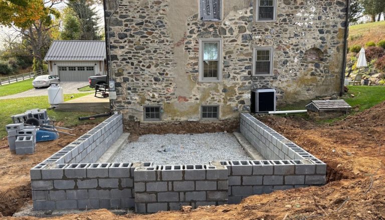 Concrete block foundation walls for the farmhouse sunroom addition