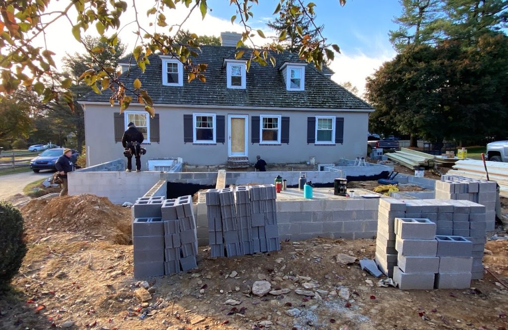 Block foundation construction for the rear addition viewed from the yard
