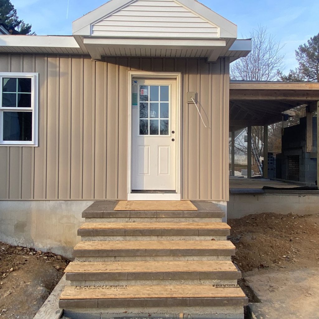 Completed exterior steps and entrance to the new rear addition