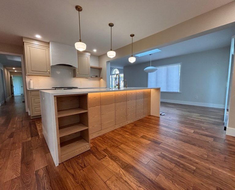 Completed kitchen photograph showing the island and connected space — Lancaster, PA