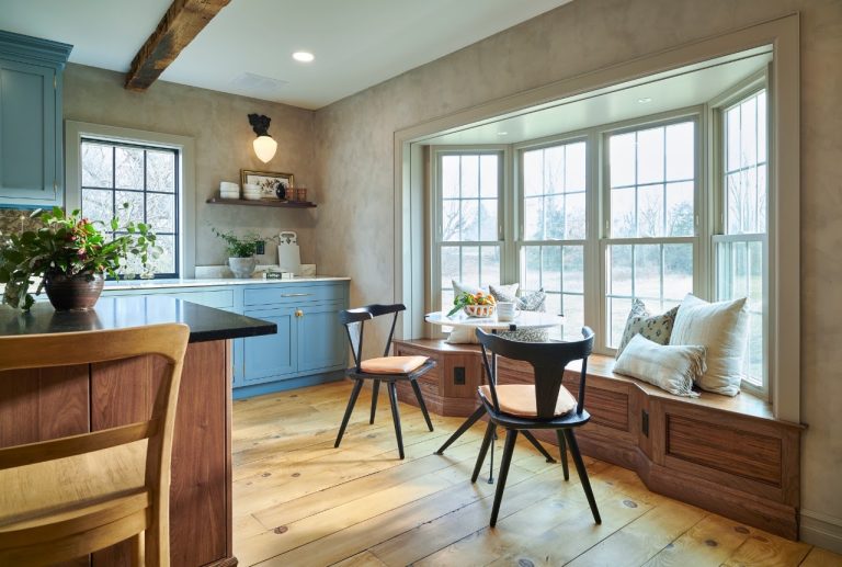 Completed kitchen breakfast nook with bay window and built-in bench