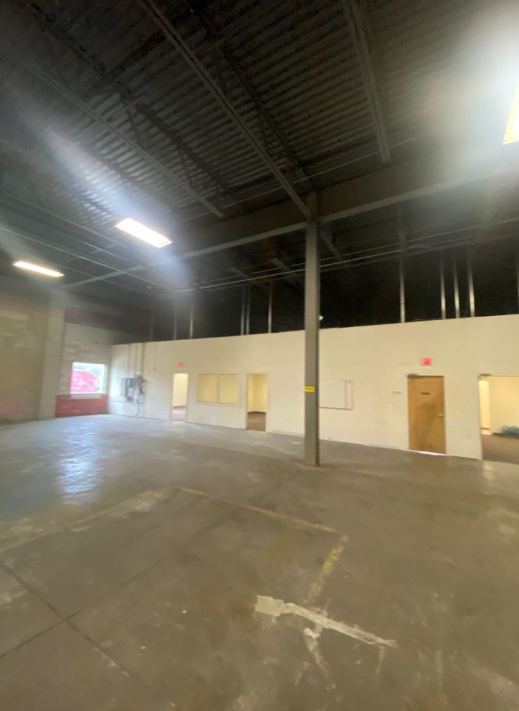 Existing empty warehouse interior in Downingtown before renovation